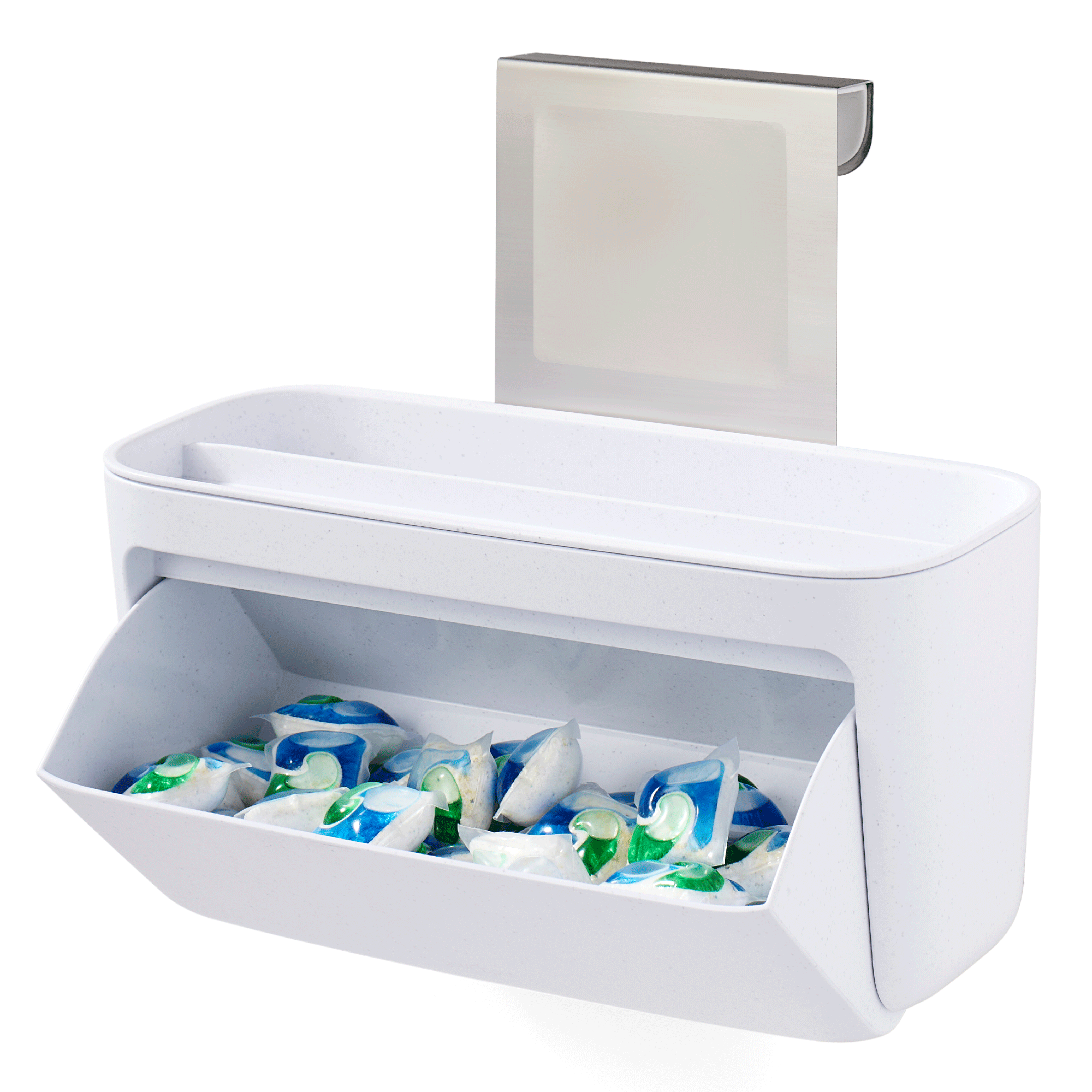 White door-mounted dishwasher detergent holder with dishwasher pods inside.