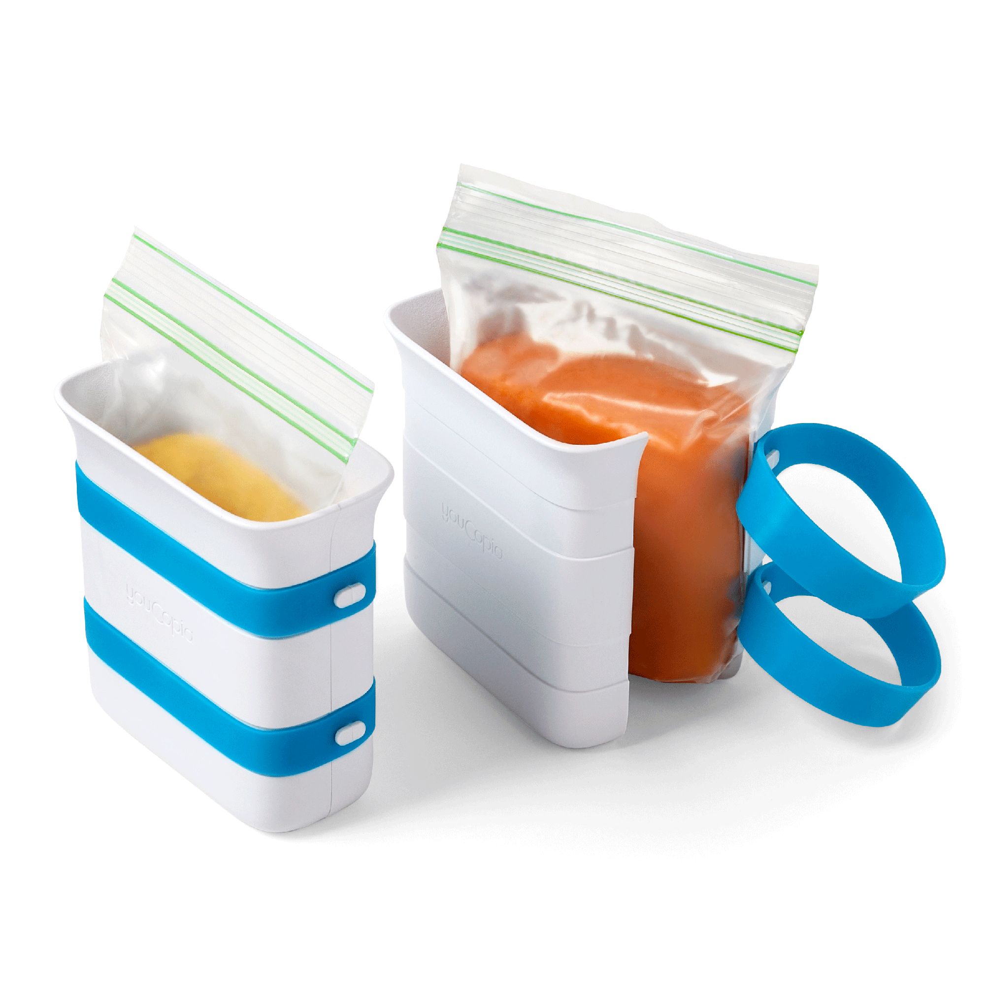 Ice Mold container with clear plastic bag filled with tomato soup on a white background.