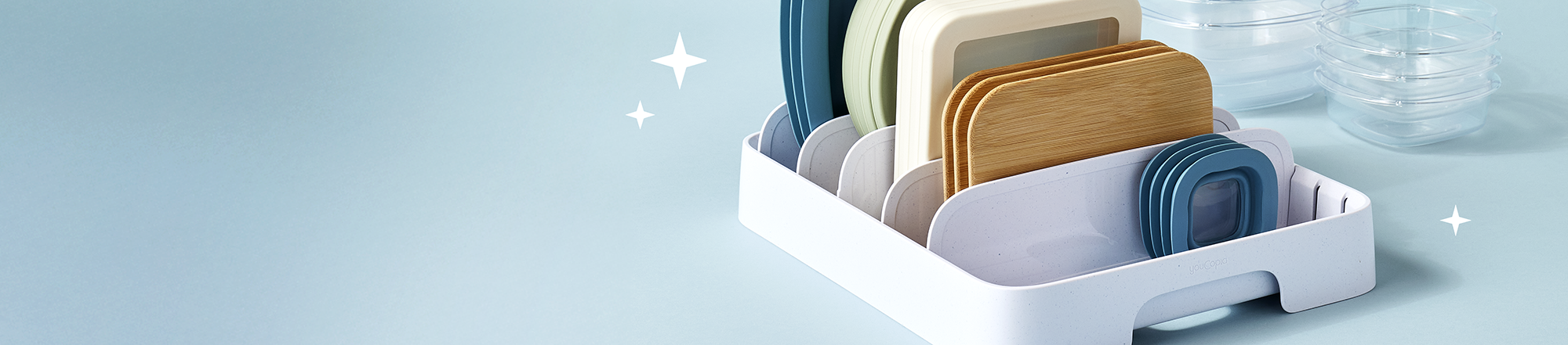 storalid container with wooden and plastic lids on a blue gradient background
