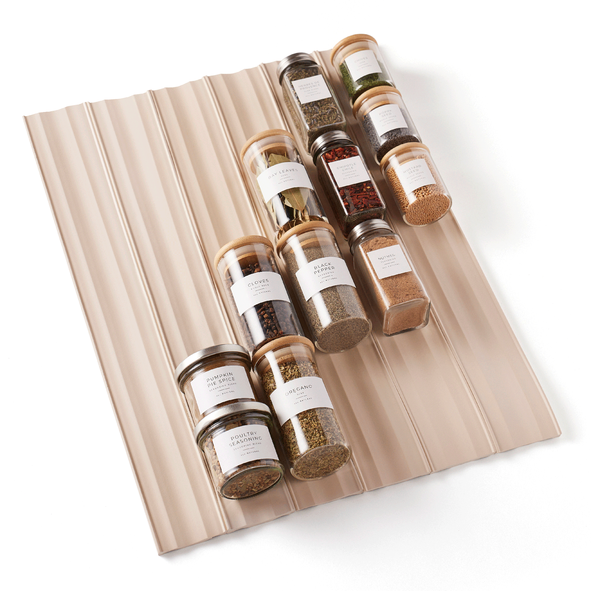 spiceliner spice drawer liners with spice jars organized on a white background