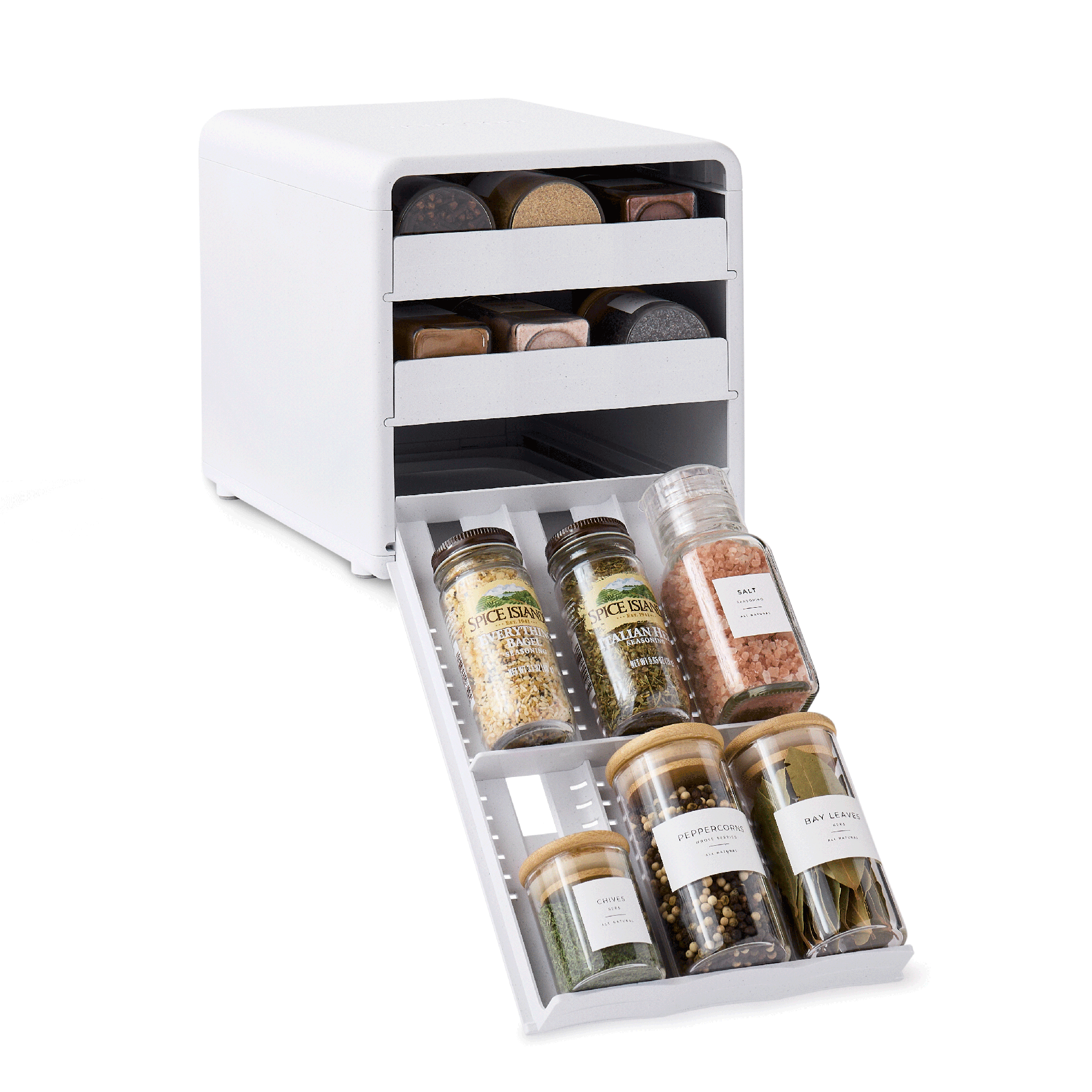 White spice rack with various spice containers on a white background