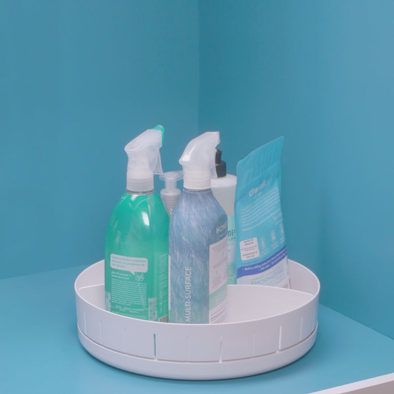turntable with cleaning supplies featuring its 360 degree rotation