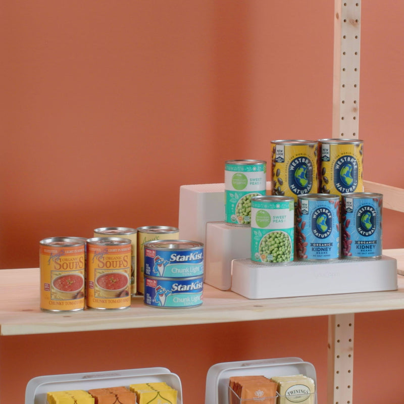 Can organizer shelfs holding cans featuring its multi use purpose